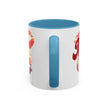 White mug with blue handle and interior, featuring colorful graphics on a white background