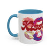 Mug with colorful design and 'Kiss' text on a white background