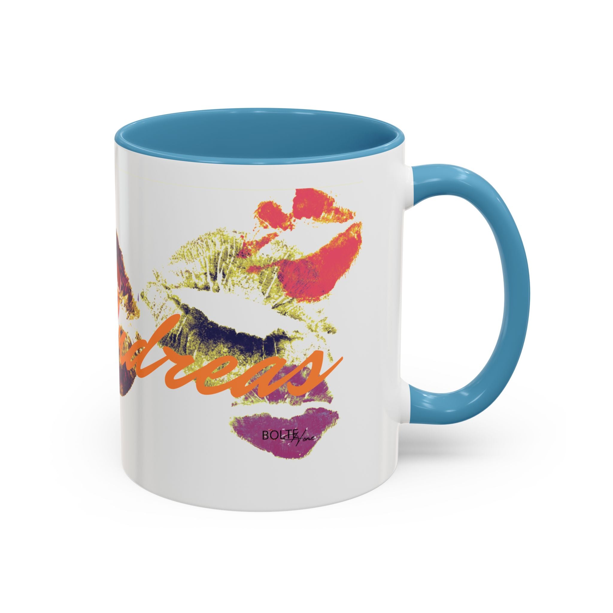 Mug with colorful lips design and blue interior and handle on a white background
