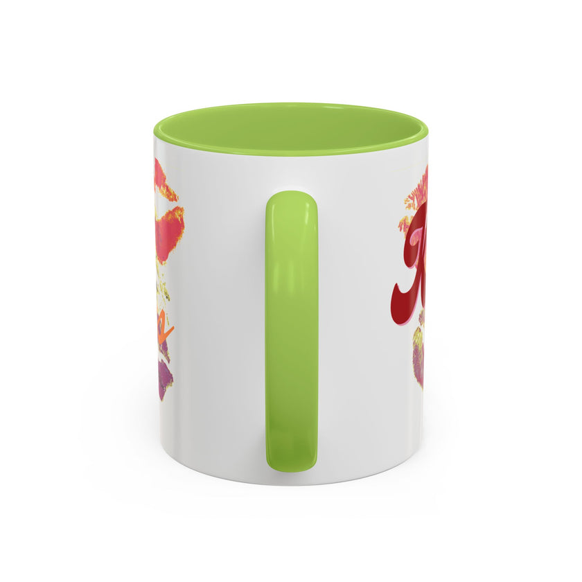 White mug with green interior and handle, featuring colorful fruit illustrations on a white background