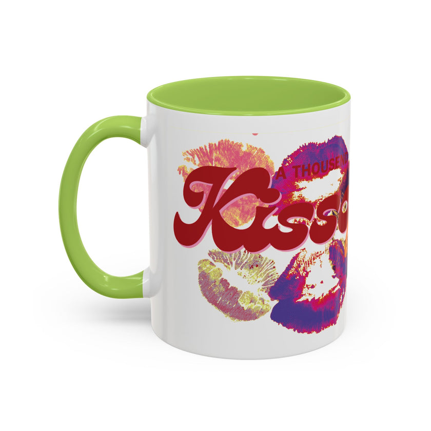 Mug with colorful 'Kiss' design and green handle on a white background