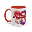 The Kiss Print Accent Coffee Mug (11oz) features a pop-art lip design with vibrant kiss marks, a red handle and rim, and bold 
