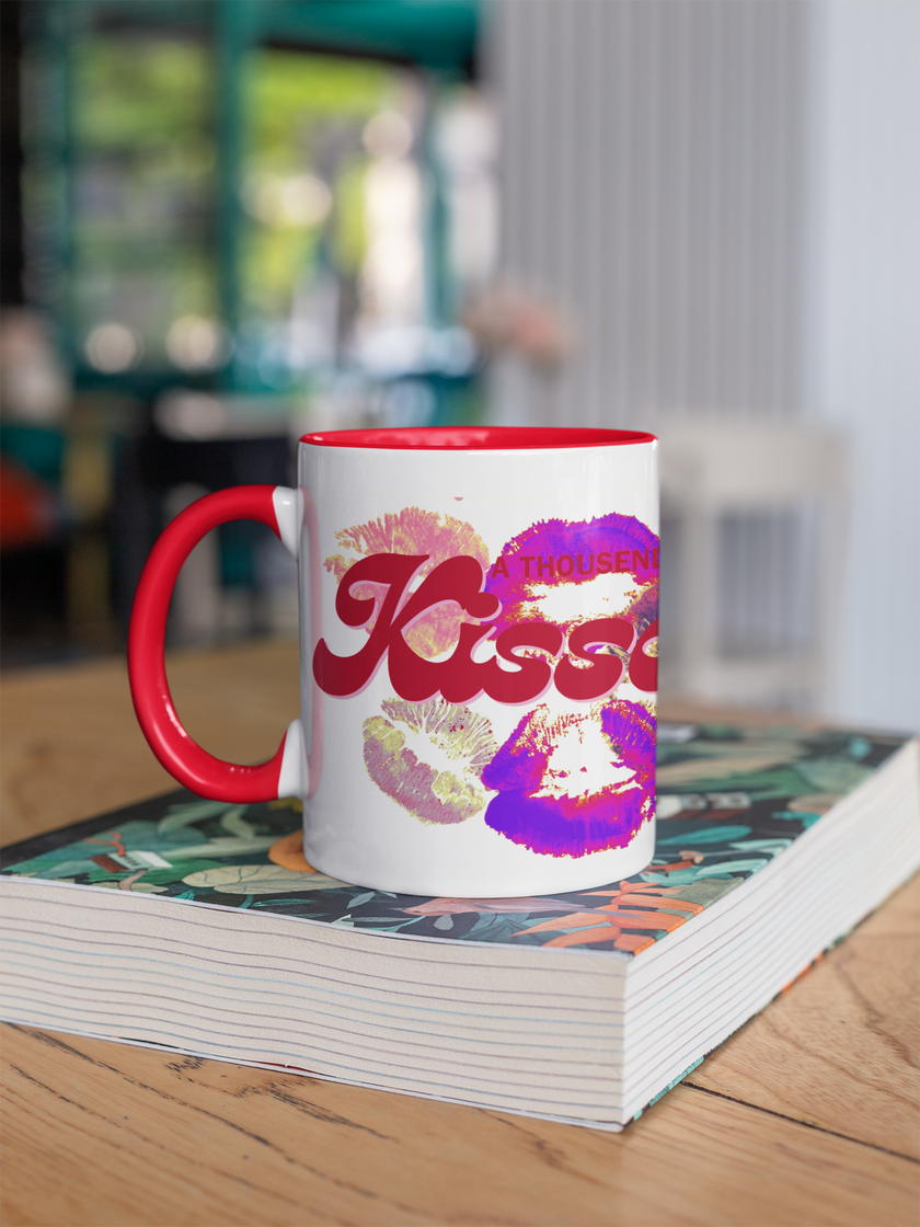 Mug with colorful design on a stack of books