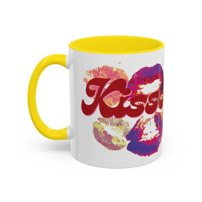 Mug with colorful design and yellow handle on a white background