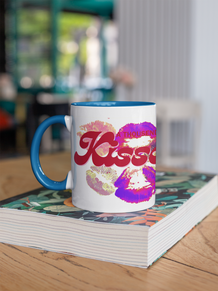 Mug with colorful design on a stack of books